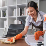 Housekeeper Cleans The Office